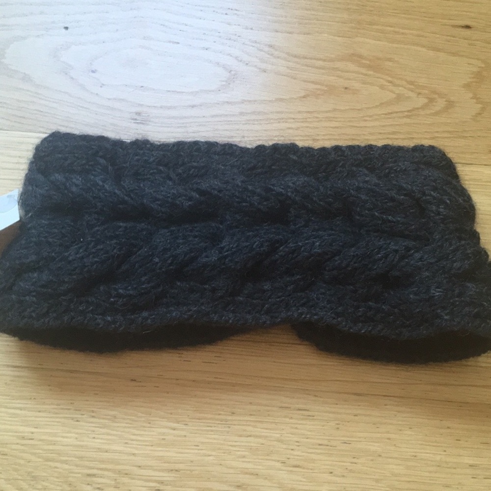 Nirvana hand knitted headband. Charcoal color.